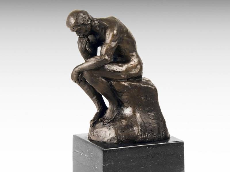 Escultura de bronze - O Pensador - desenhada por Auguste Rodin