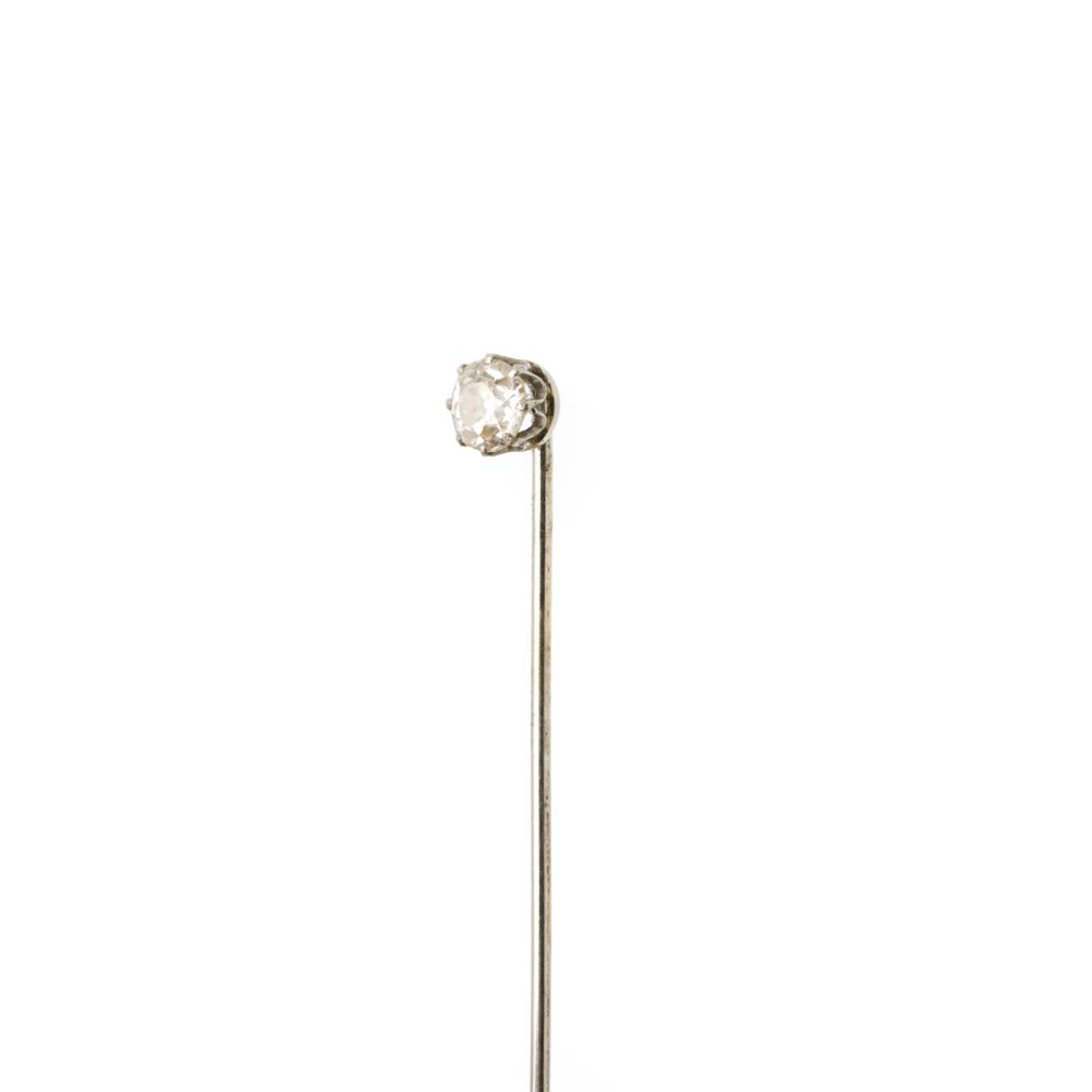 Pregadeira de gravata; em ouro 19.2K com diamante